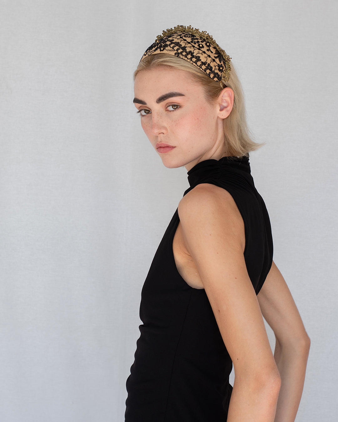 Black and gold Goldreifen with sheer Austrian lace and golden pearl accents over caramel silk, handmade in Vienna by Niely Hoetsch