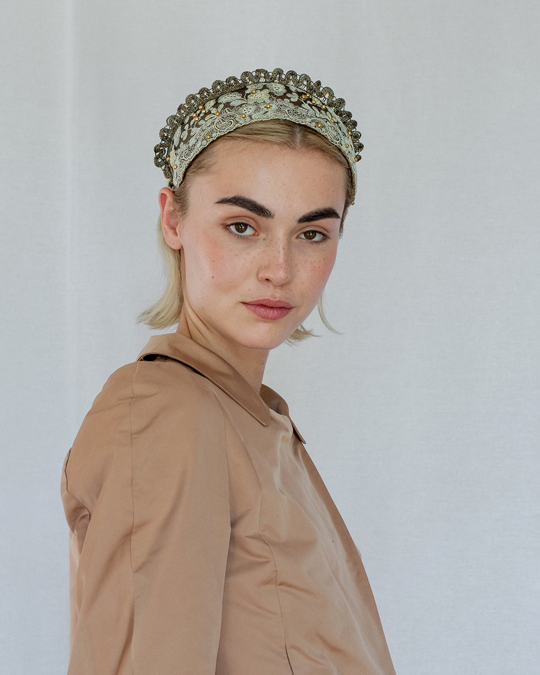 Black and gold Goldreifen with butter floral embroidery on sheer tulle, lined in golden silk, handmade in Vienna by Niely Hoetsch