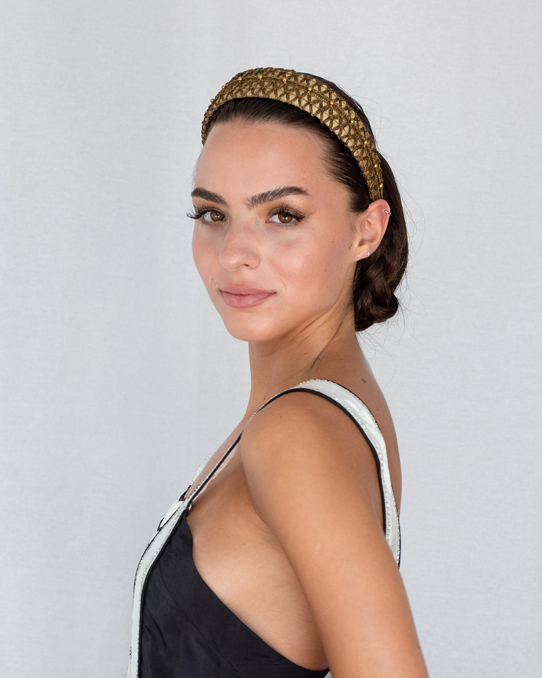 Mini gold headband in dupion silk with antique black metal trims and golden pearl embroidery, handmade in Vienna by Niely Hoetsch