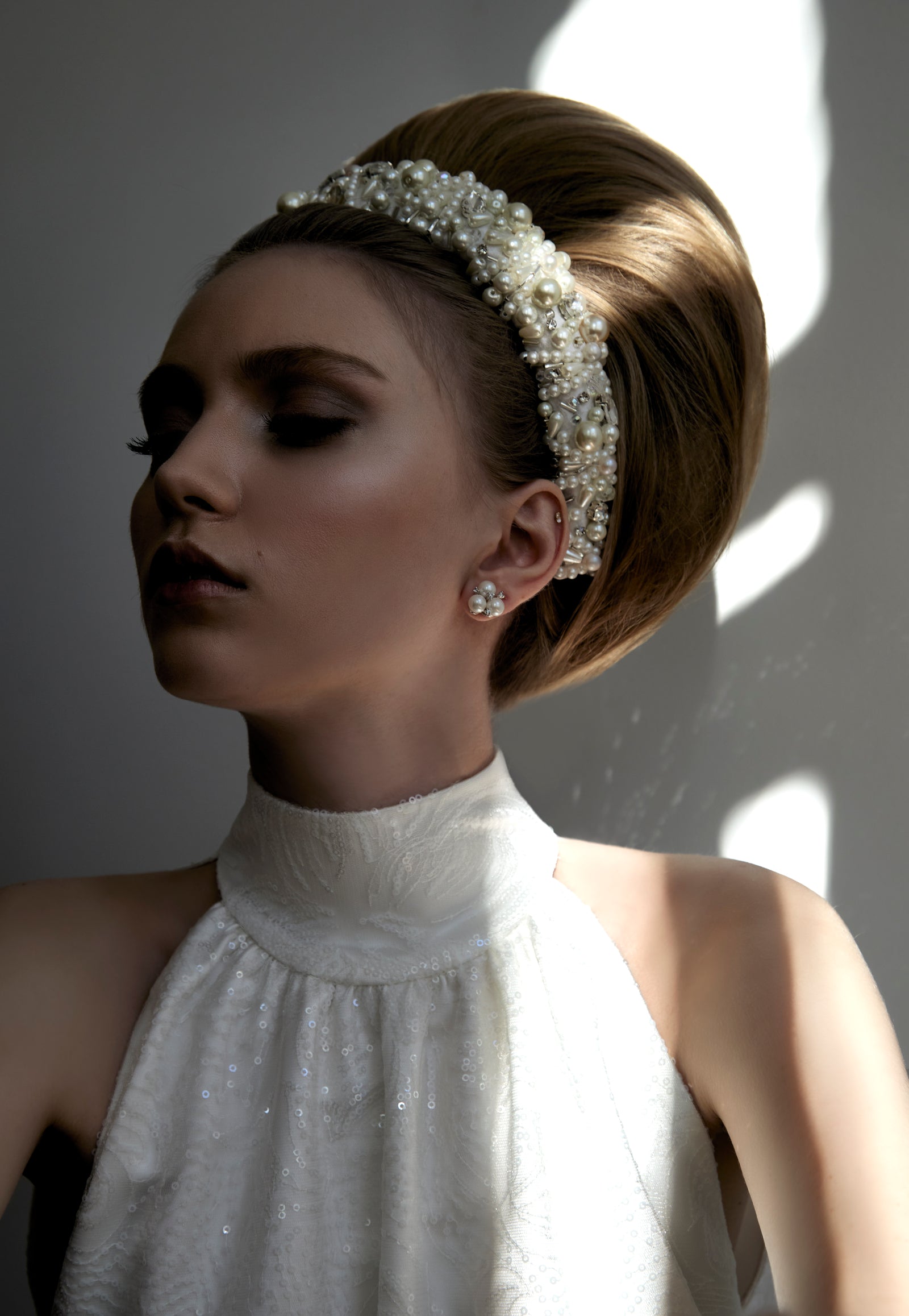 Off-white padded silk headband embroidered with acrylic pearls and crystals, handmade in Vienna by Niely Hoetsch